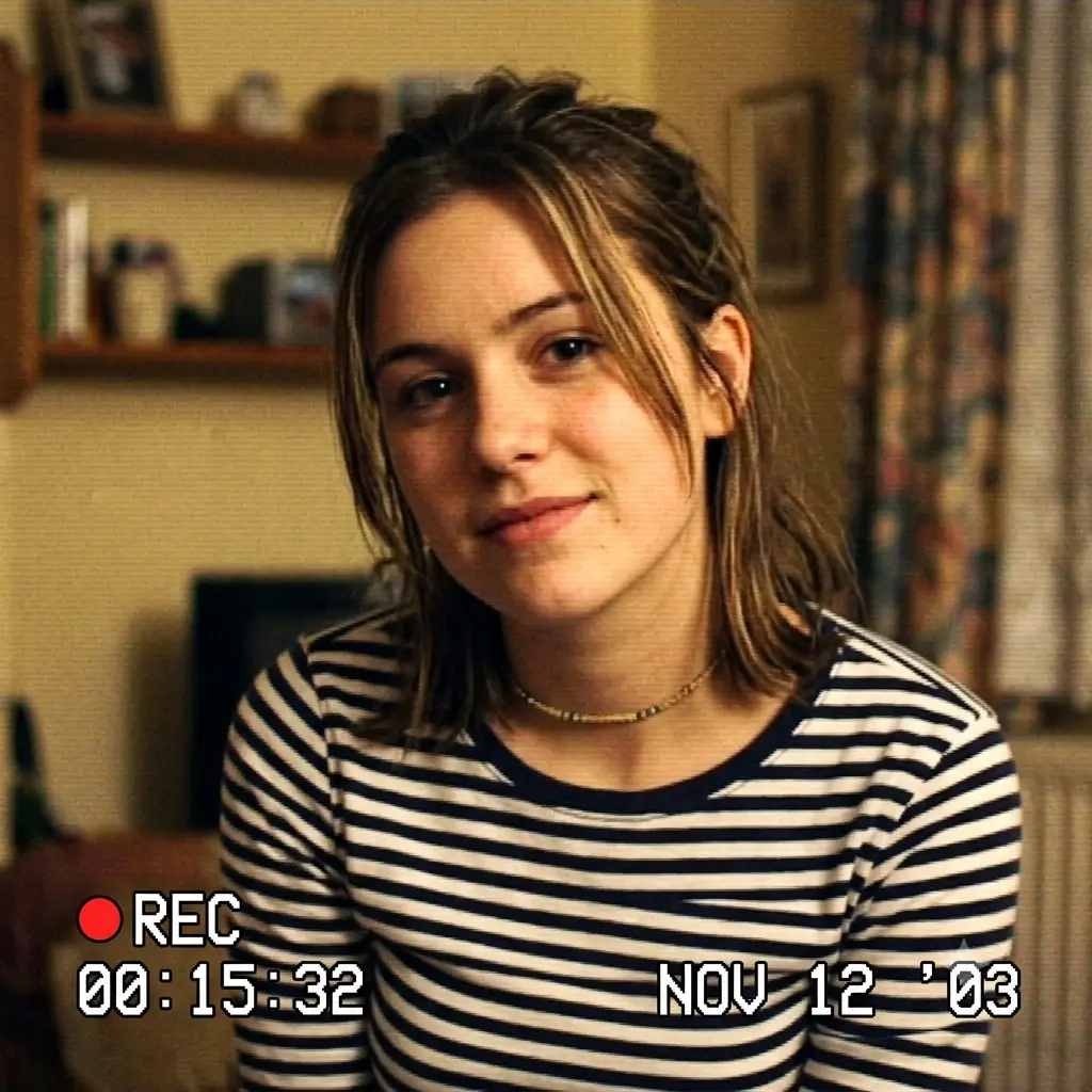 Still frame from an early-2000s camcorder with a timestamp and REC overlay